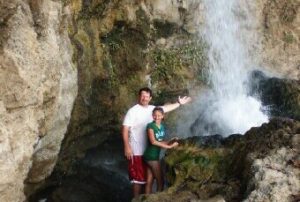 family-at-waterfall